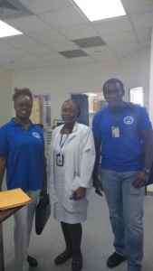 Chair of Southern Branch Mrs. Murry John, and Mr. Corey Dillon Secretary empower a senior staff nurse on general surgery ward 7 SFGH