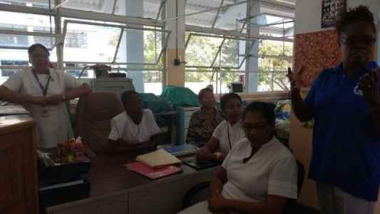 Full Attention the staff of ward 3 Admitting Surgery, listens attentively as Mrs Murray-John shares information about joining TTRNA and benefits of membership.