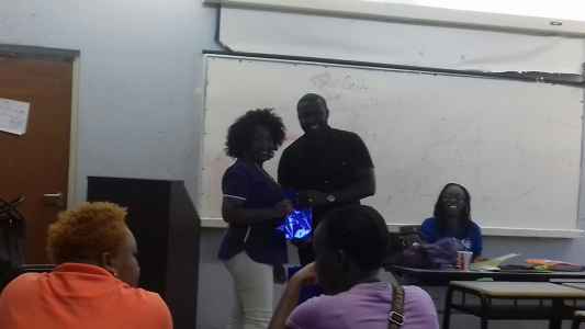 Nurse Janelle Jacobs receives a welcome gift